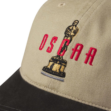 Beige cap with embroidered Oscar statue and 'OSCAR' text on a white background